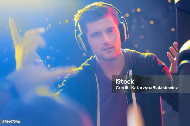 Charismatic Dj Wearing Headphones Stock Photo - Download Image Now - 20-29 Years, Adolescence, Adult