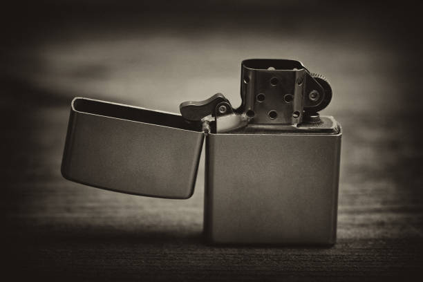 istock Cigarette lighter silver metal. Known lighter with a hinged lid 678500304