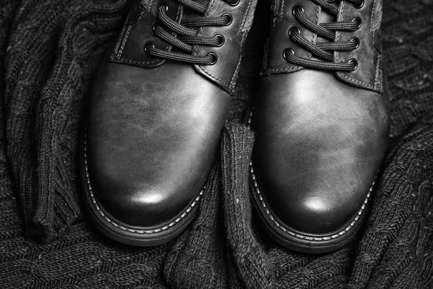 istock Boots and a sweater. High leather shoes 678501154