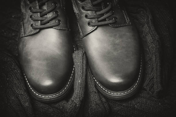 istock Shiny leather boots and a knitted warm sweater. Clothes and shoes 678501160
