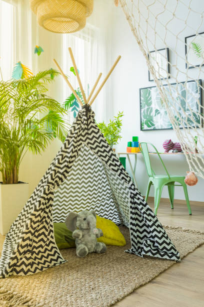 istock Tent and hammock in a room 678502572