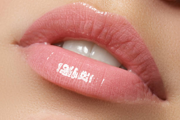 Perfect Lips. Sexy Girl Mouth close up. Beauty young woman Smile Perfect Lips. Sexy Girl Mouth close up. Beauty young woman Smile. Natural plump full Lip. Lips augmentation. Close up detail big fat lips stock pictures, royalty-free photos & images