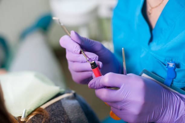 istock Doctor holding a composite cements for the treatment 678508532