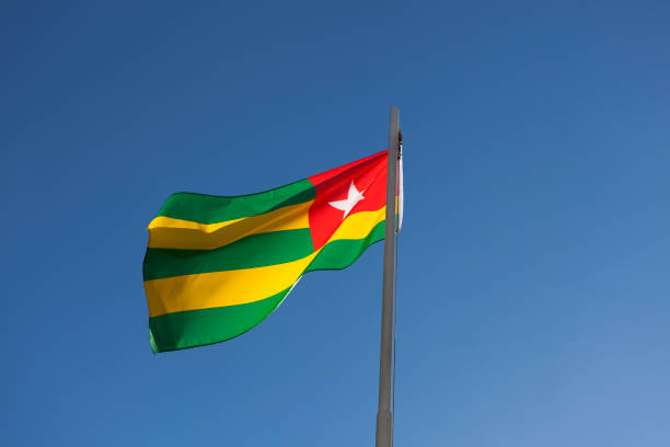 istock National flag of Togo on a flagpole 678512726