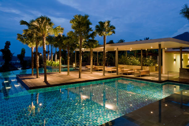 istock Luxury Island Villa Home With Swimming Pool At Sunset 678513822