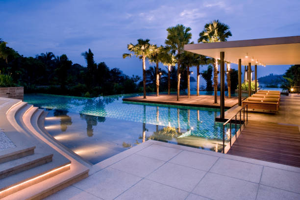 istock Luxury Island Villa Home With Swimming Pool At Sunset 678513854