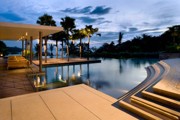 istock Luxury Island Villa Home With Swimming Pool At Sunset 678513886