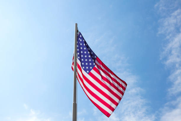 istock Flag of United States on a flagpole 678525874