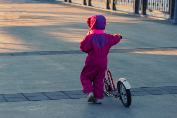istock Happy child riding a bike. 678526904