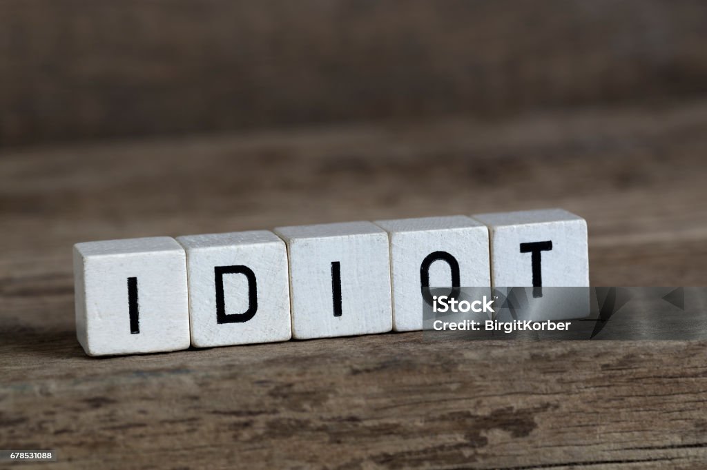 Idiots Lettering Idiot Written In Cubes Stock Photo - Download Image Now - Fool ...