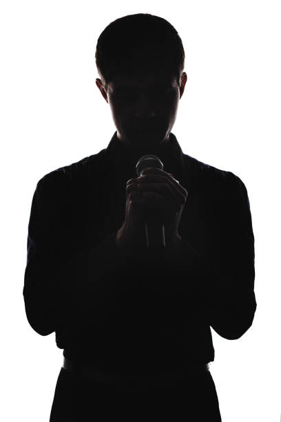 istock Portrait of a man with a microphone 678535112