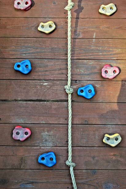 istock Fragment of a climbing wall on sky background 678536958