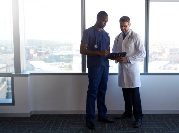 istock Hospital Staff Meeting And Review Notes On Digital Tablet 678551506