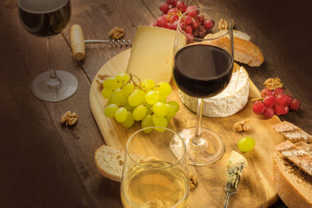 istock Wine and cheese tasting with bread and grapes 678553546