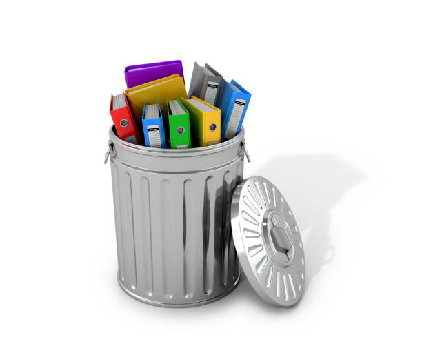istock Multicolored folders in a trash can. 3D illustration. 678554328