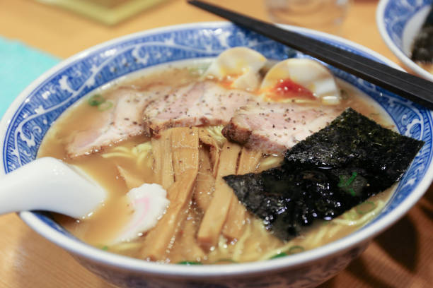 istock Ramen Japanese noodles with bamboo shoots and eggs 678574510
