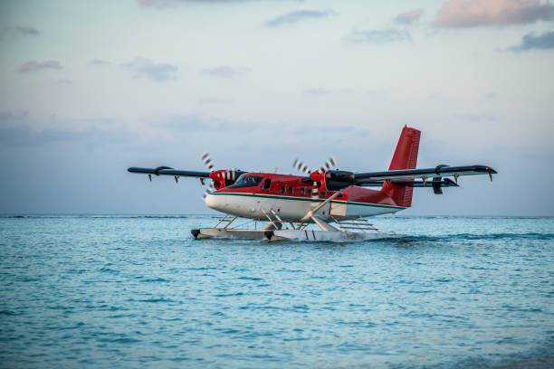 istock Seaplane landing in the ocean lagoon. 678577814