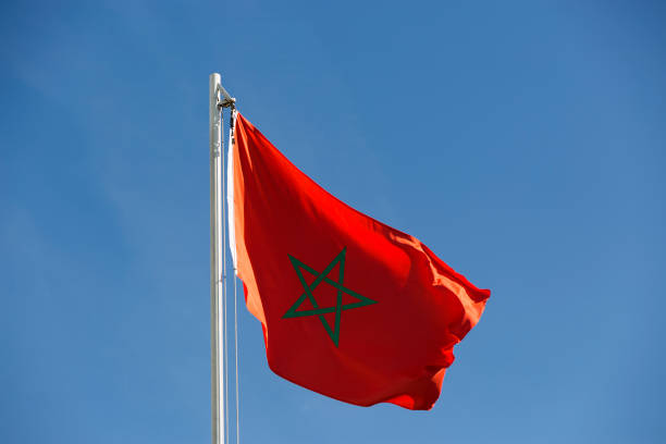istock National flag of Morocco on a flagpole 678577944