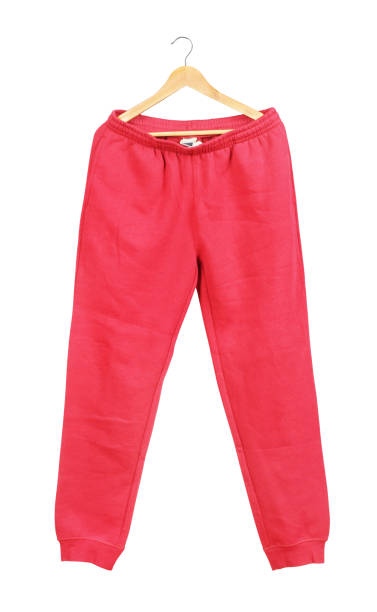 istock Red sweat pants on a hanger isolated on white background 678584358
