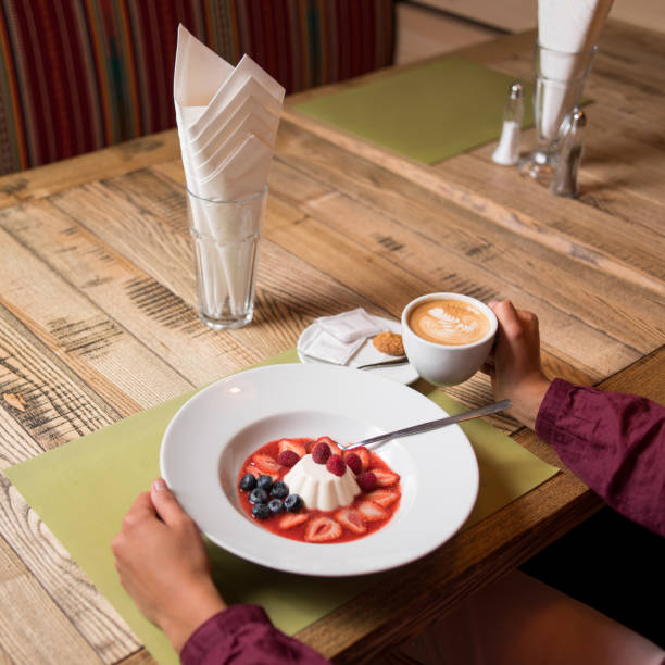 istock milky creamy pudding with jam and berries blueberries, strawberry 678589070
