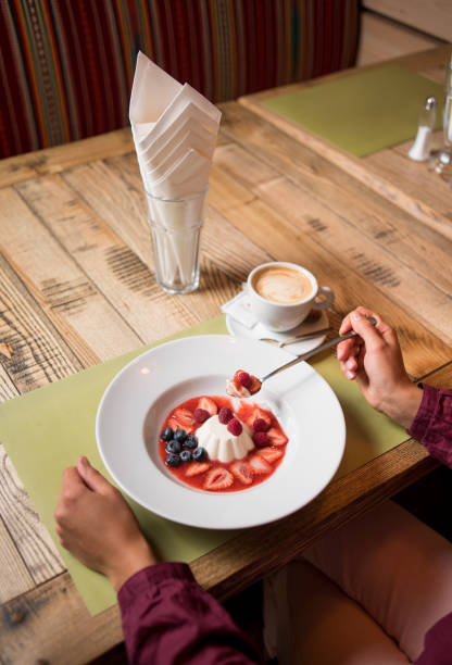 istock milky creamy pudding with jam and berries blueberries, strawberry 678589080