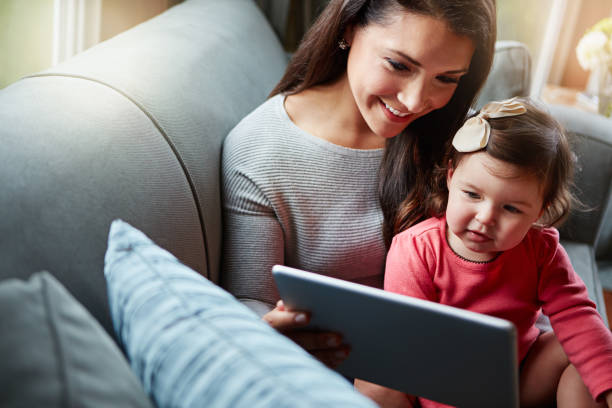 istock The internet is an enthralling place for her little mind 678589538