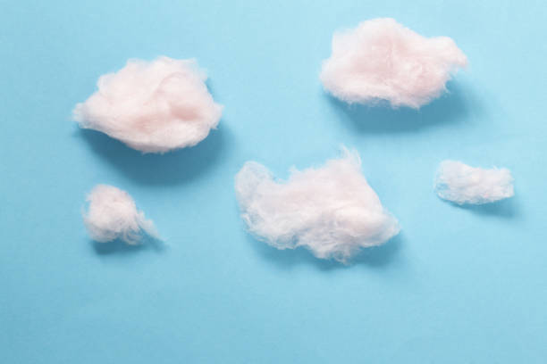 istock Sweet pink cotton candy in a waffle cone 678594504