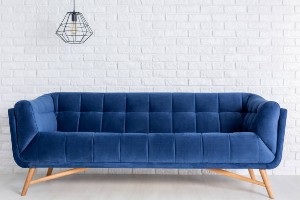 istock Blue sofa and fancy lamp 678603820