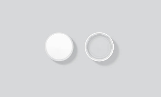 istock Blank white plastic bottle caps mock up set isolated, top 678608418