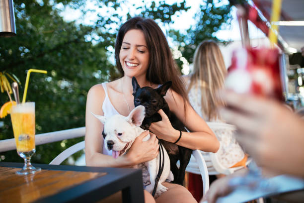 istock Woman with dog in cafe 678609532