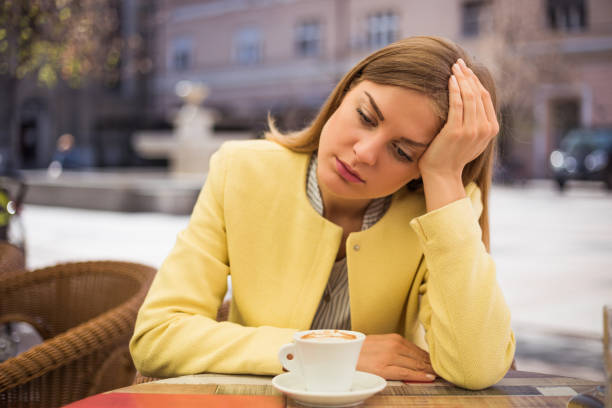 istock Sad woman at the  cafe 678624172