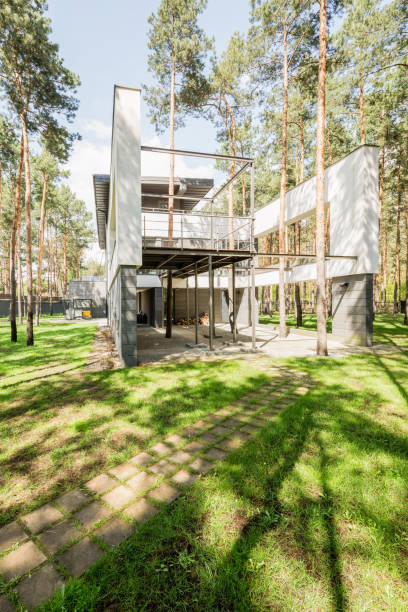 istock Modern stylish house in the forest 678627632
