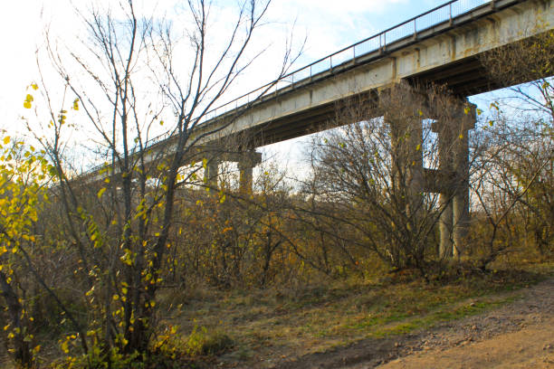 istock Bridge across the river Southern Bug in Ukraine on autumn 678634488