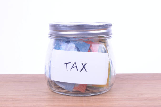 istock Saving Australian dollars for tax time 678634786