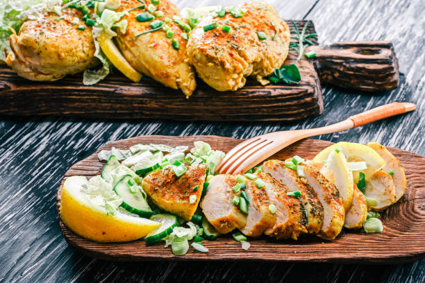 istock Roasted chicken breast on rustic wood 678639446