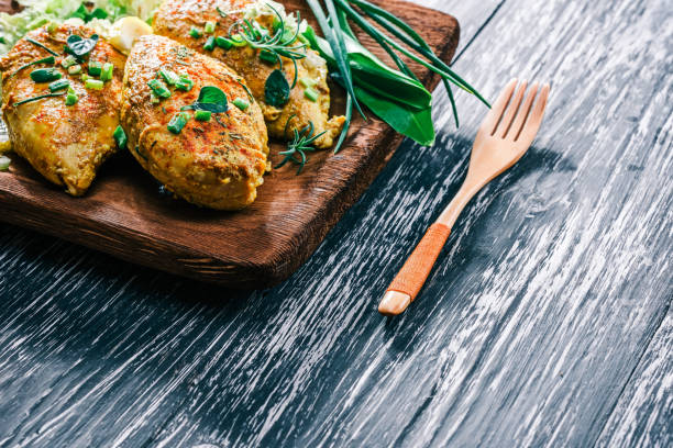 istock Roasted chicken breast on rustic wood 678644814