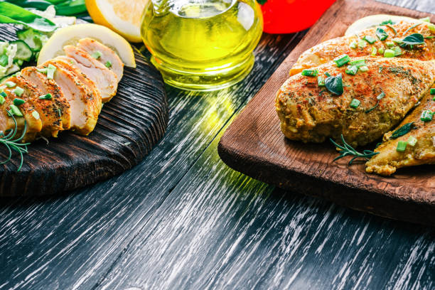 istock Roasted chicken breast on rustic wood 678645414