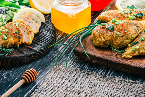 istock Roasted chicken breast on rustic wood 678646030