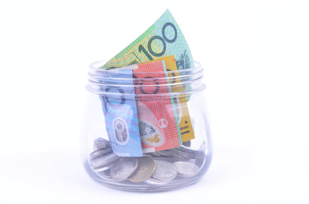 istock Saving Australian dollars in a glass jar 678653468