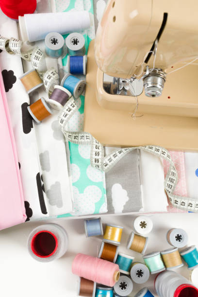 istock Sewing machine, fabric and measurement tape 678653562