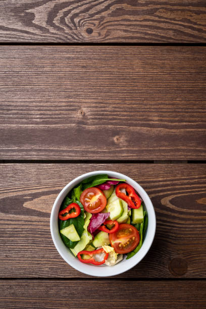 istock Vegetables salad in white bowl. 678656848