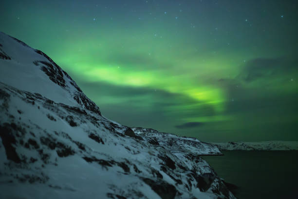 istock Northern lights. Aurora borealis nature landscape at night 678678186
