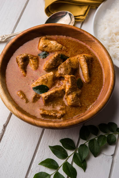 istock tasty fish curry served with white cooked basmati rice with curry leaves in the background, favourite coastal indian food 678685214