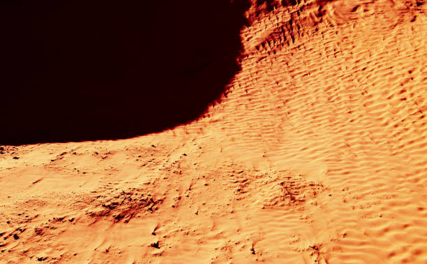 istock Red-yellow bloody desert texture and background. Natural patterns on the sand 678698334