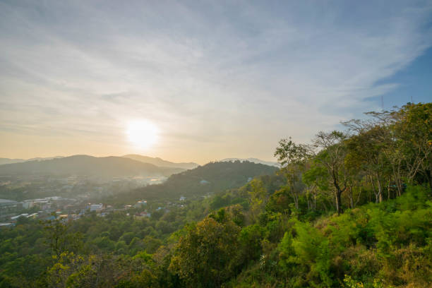 istock beautiful sunset over city  mountain backdrop 678707798