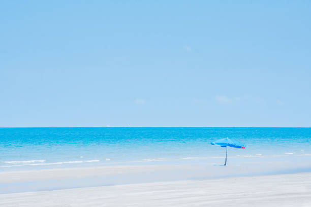 umbrella on the beach blue sea summer vacationumbrella on the beach blue sea summer vacation
