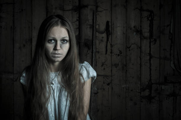 istock Horror girl in white dress 678733580
