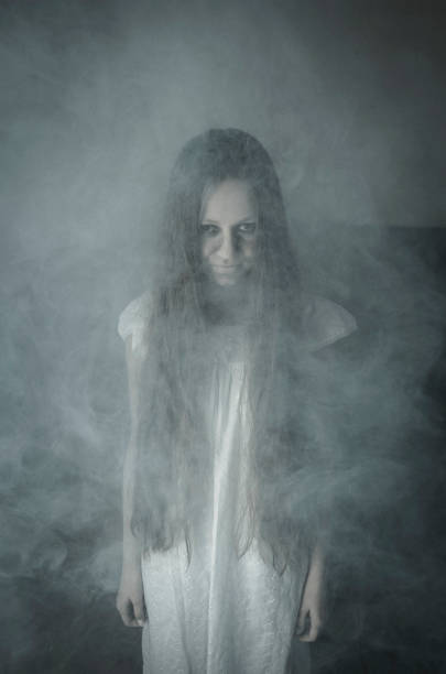 istock Horror girl in white dress 678735596