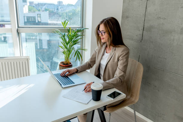 istock Business woman working on computer 678740088