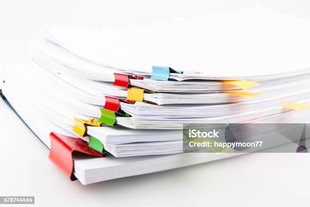 Pile Of Documents With Colorful Clips Stock Photo - Download Image Now - Paper, Document, Stack